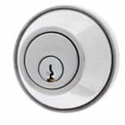 Circular chrome lock cylinder with CARBINE engraved above the keyhole
