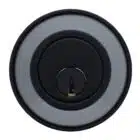 Matte black circular Carbine lock cylinder with a central keyhole