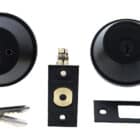 Matte black deadbolt lock set including interior and exterior faces, latch, strike plate, and two keys